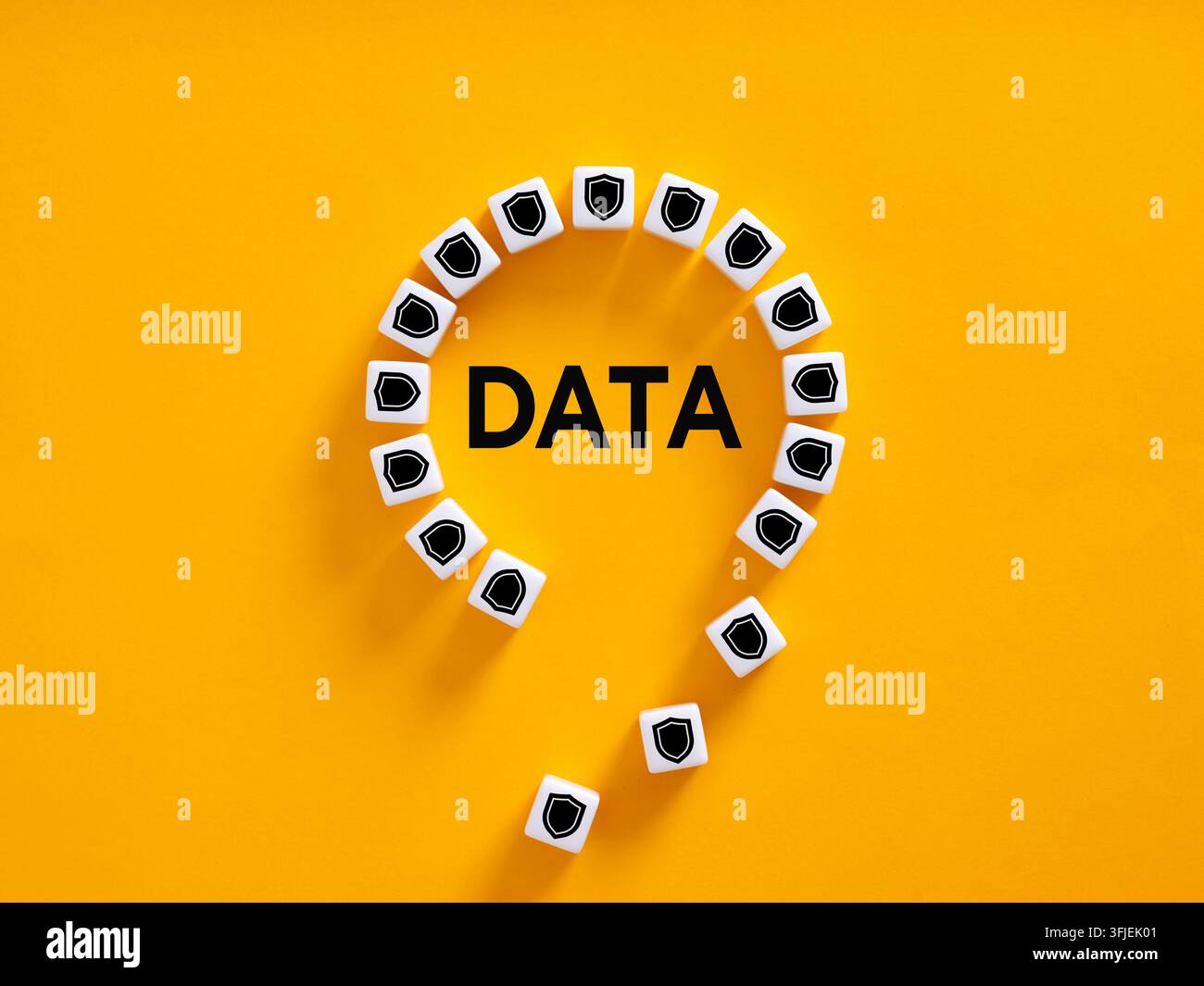 Data security concept showing vulnerable information and potential data breach risk, formed by breached shield blocks. Stock Photo