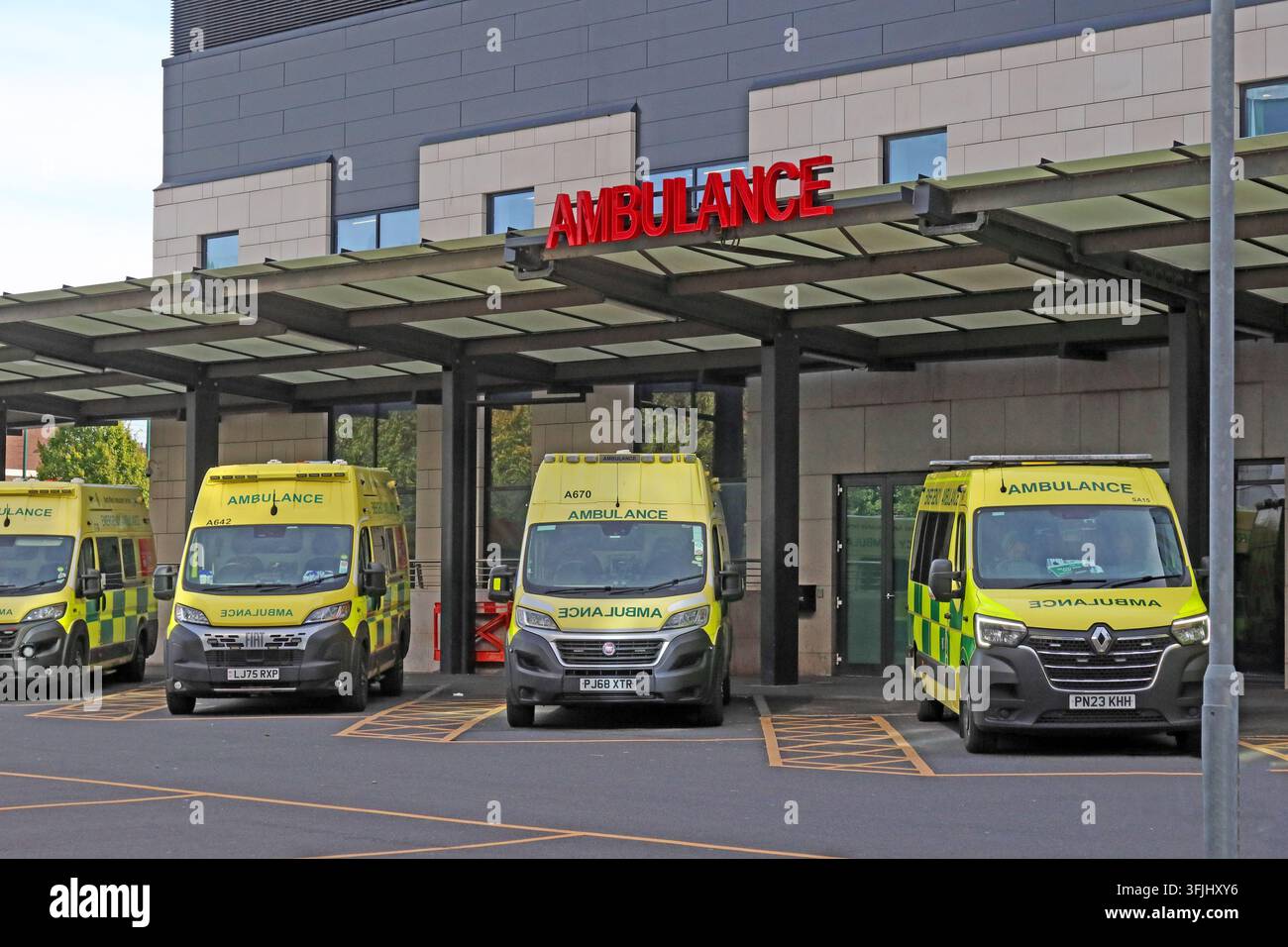 North West Ambulance Service emergency ambulances parked outside the Accident and Emergency entrance at the Royal Liverpool University Hospital. Stock Photo