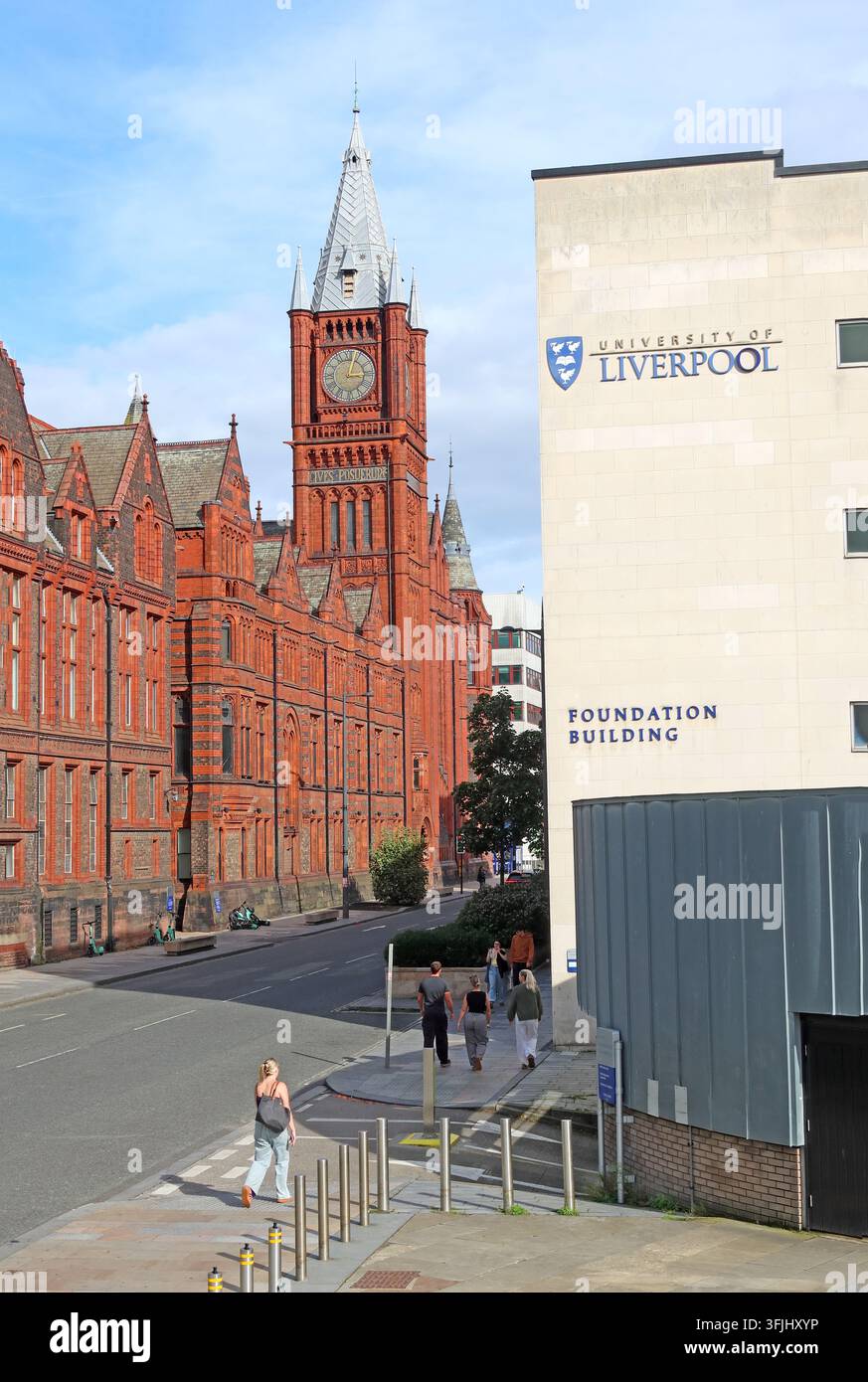 University of Liverpool campus with the red-brick Victoria Building and its landmark clock tower in the city’s Knowledge Quarter. Stock Photo