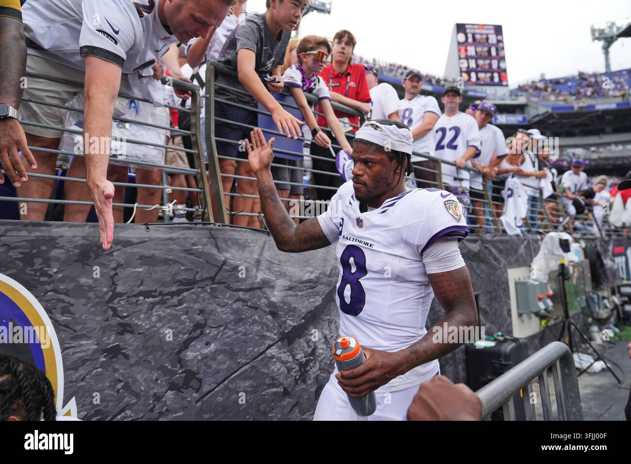 Baltimore Ravens quarterback Lamar Jackson (8) walks of the field after ...