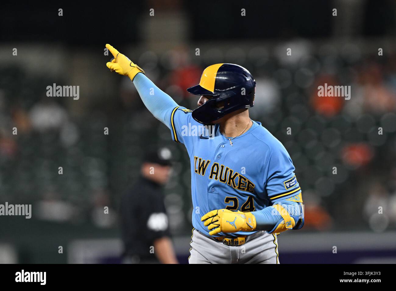 Milwaukee Brewers catcher William Contreras (24) points after hitting a ...