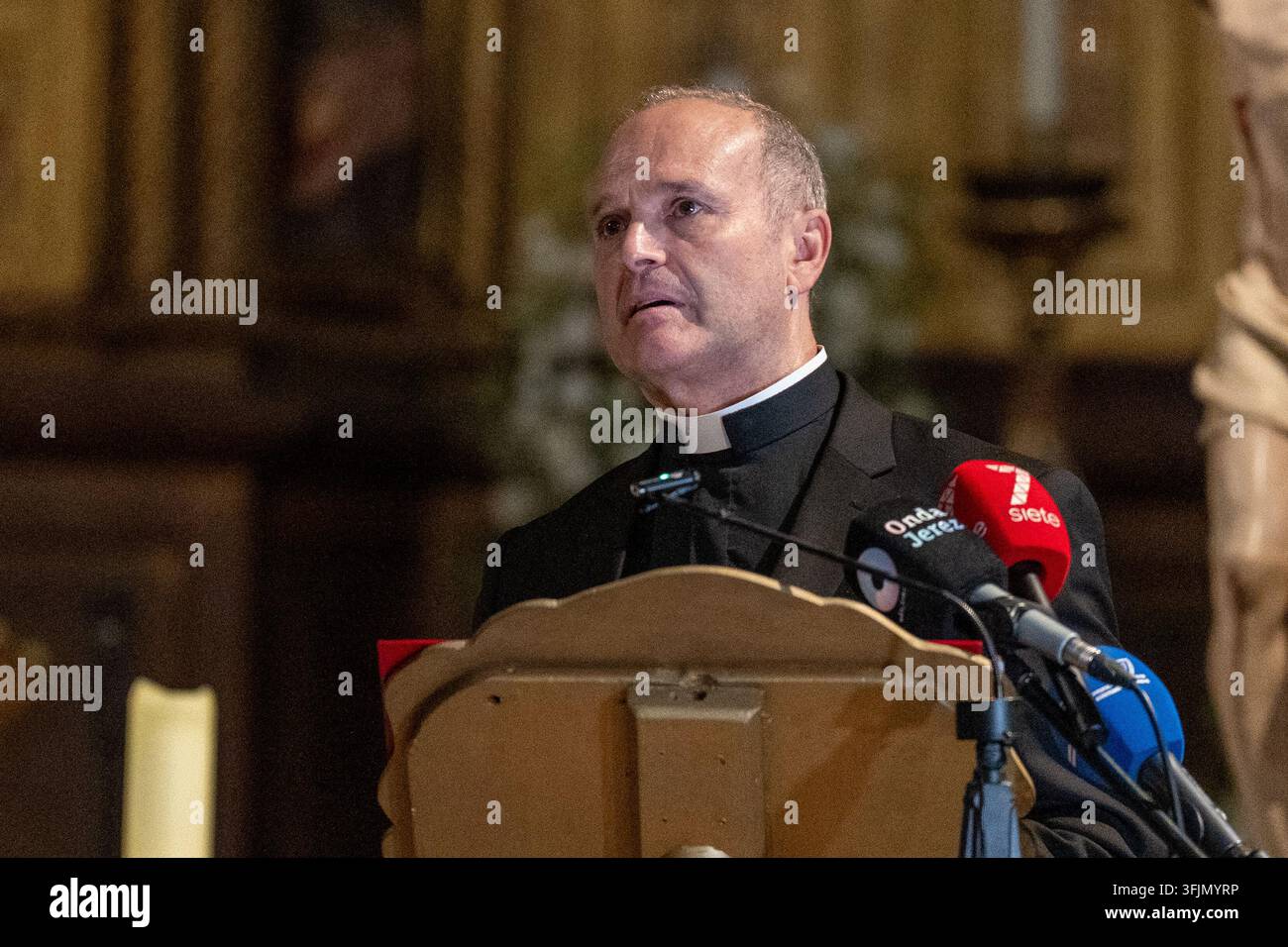The parish priest of San Miguel, Luis Piñero, speaks during the ...