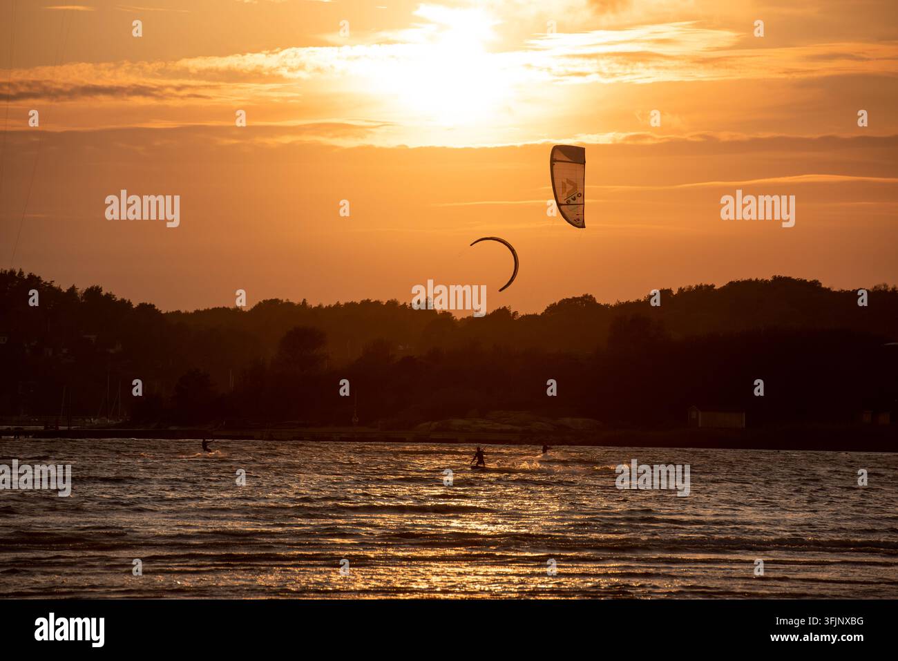Gothenburg, Sweden - October 10 2021: Kiteboarders kitesurfing in the ...