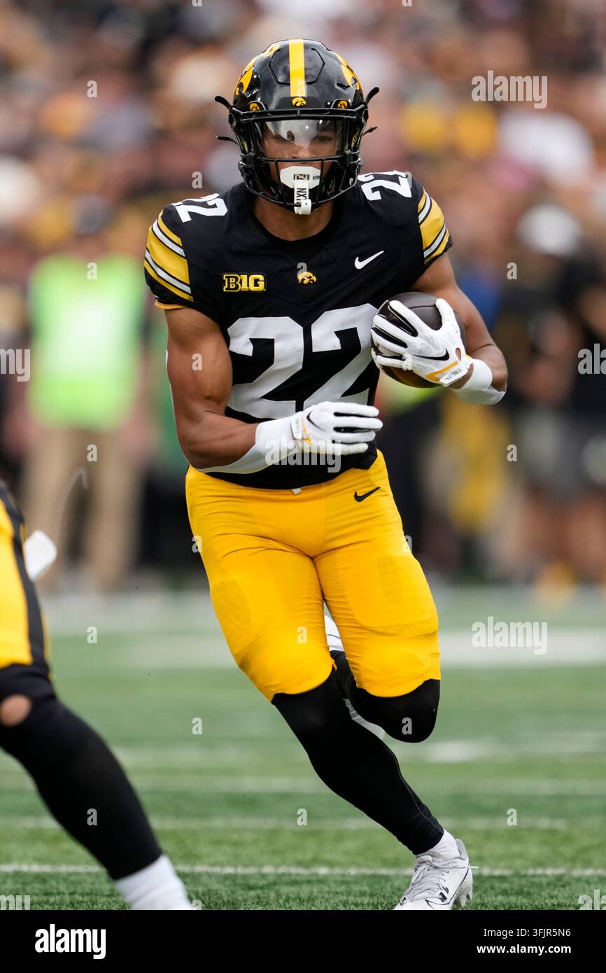Iowa running back Braeden Jackson runs up field during the first half ...