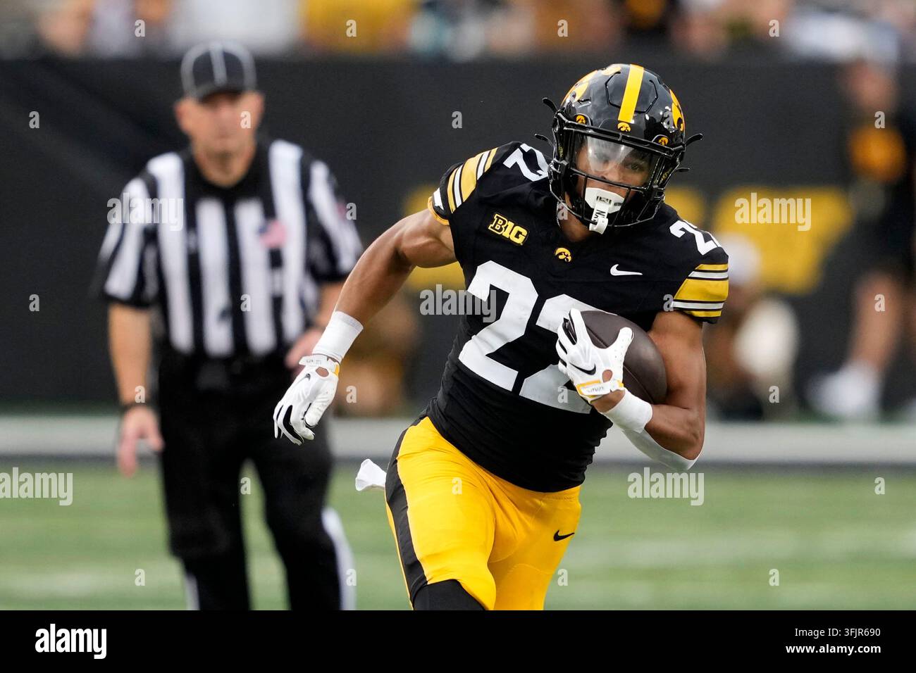 Iowa running back Braeden Jackson runs up field during the second half ...