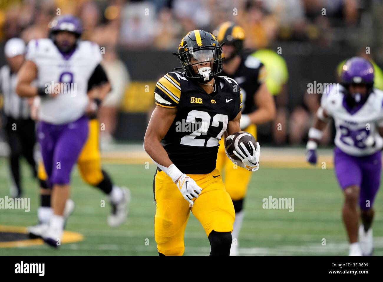 Iowa running back Braeden Jackson runs up field during the second half ...