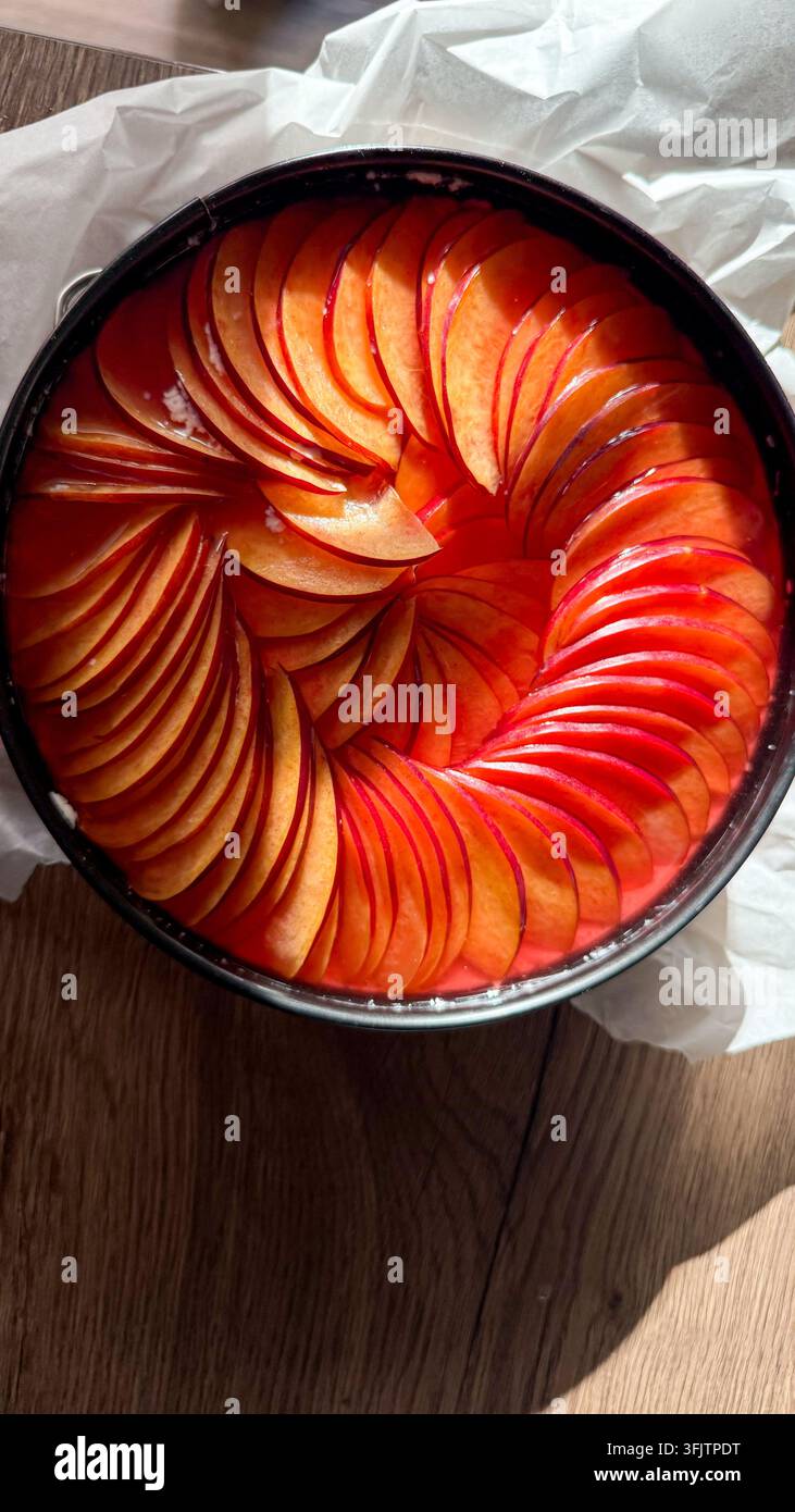Peach plum tart cake preparing for baking Stock Photo