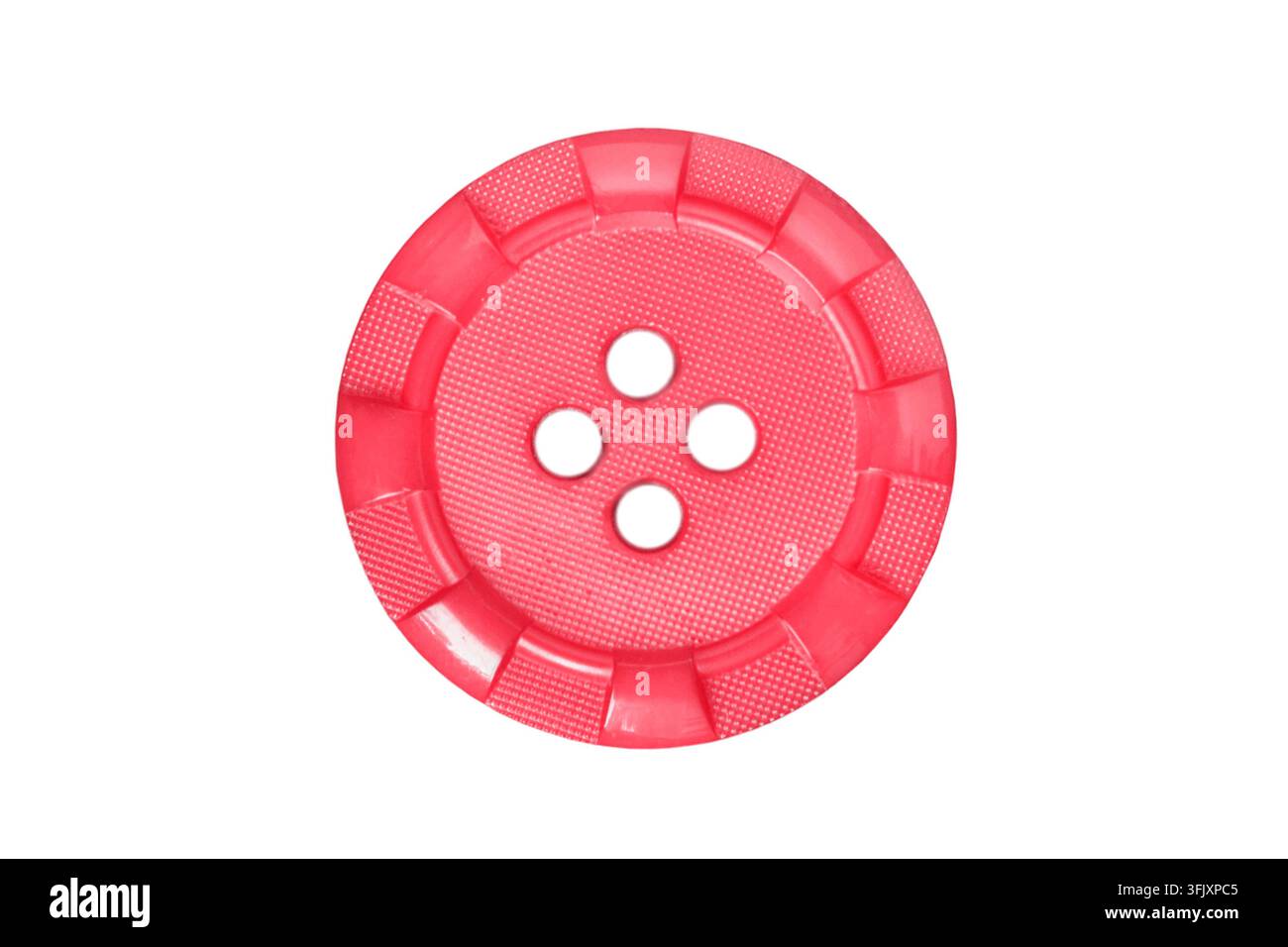 Red plastic round clothes button isolated on white background Stock Photo