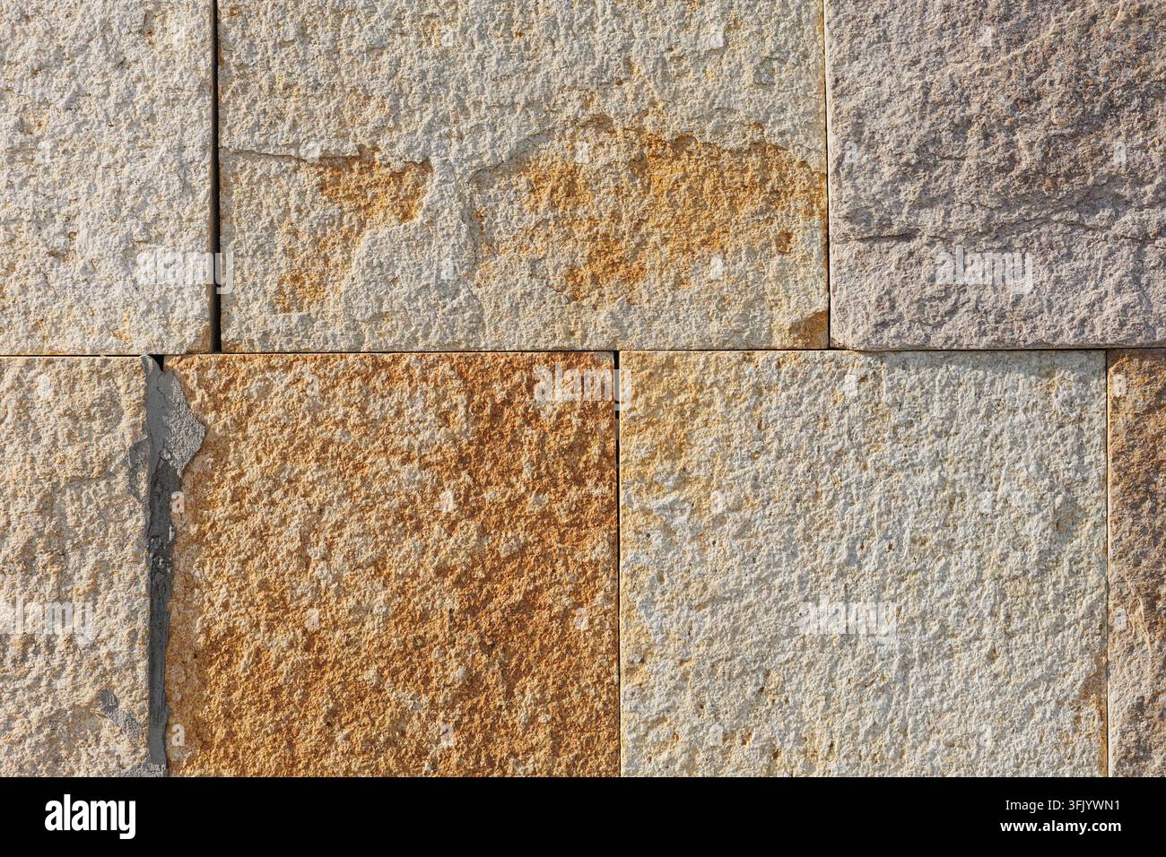Patterned Stone Wall Background With Beige And Gray Blocks Stock Photo