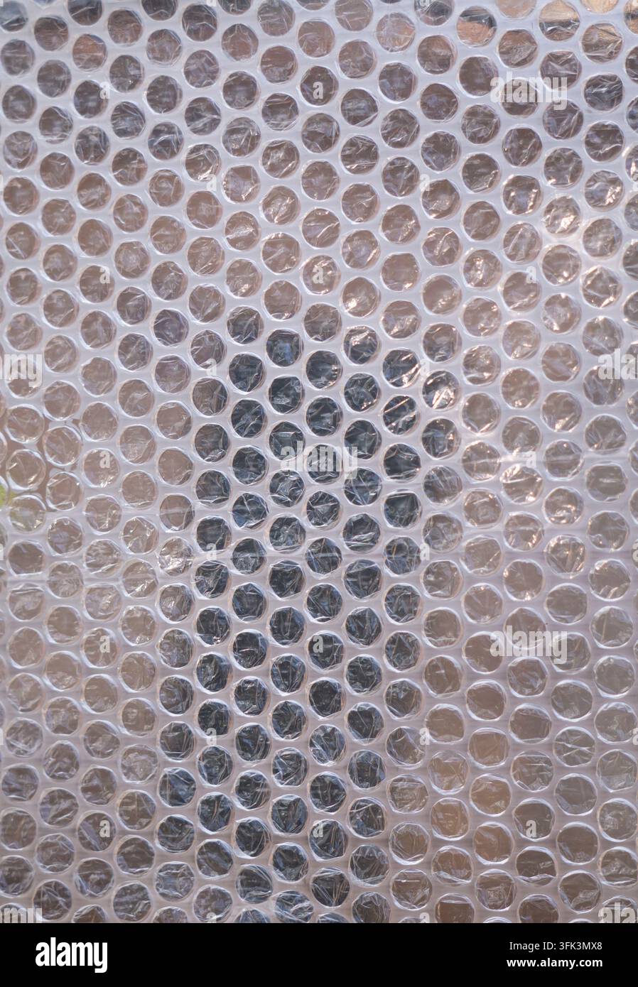 Transparent Bubble Wrap Texture Background with Circular Air Cushion Pattern Stock Photo