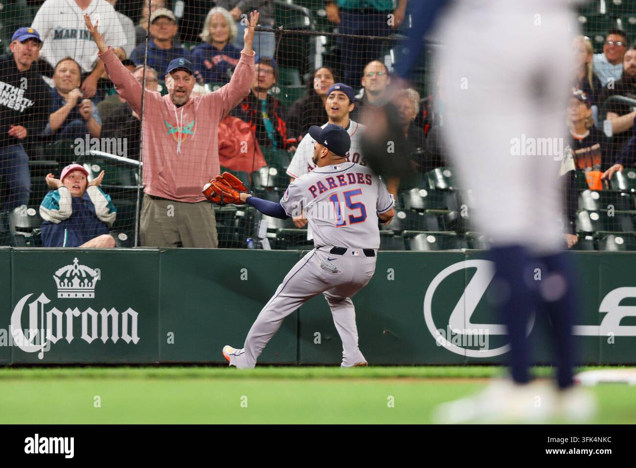 Houston Astros third baseman Isaac Paredes (15) catches a foul ball hit ...