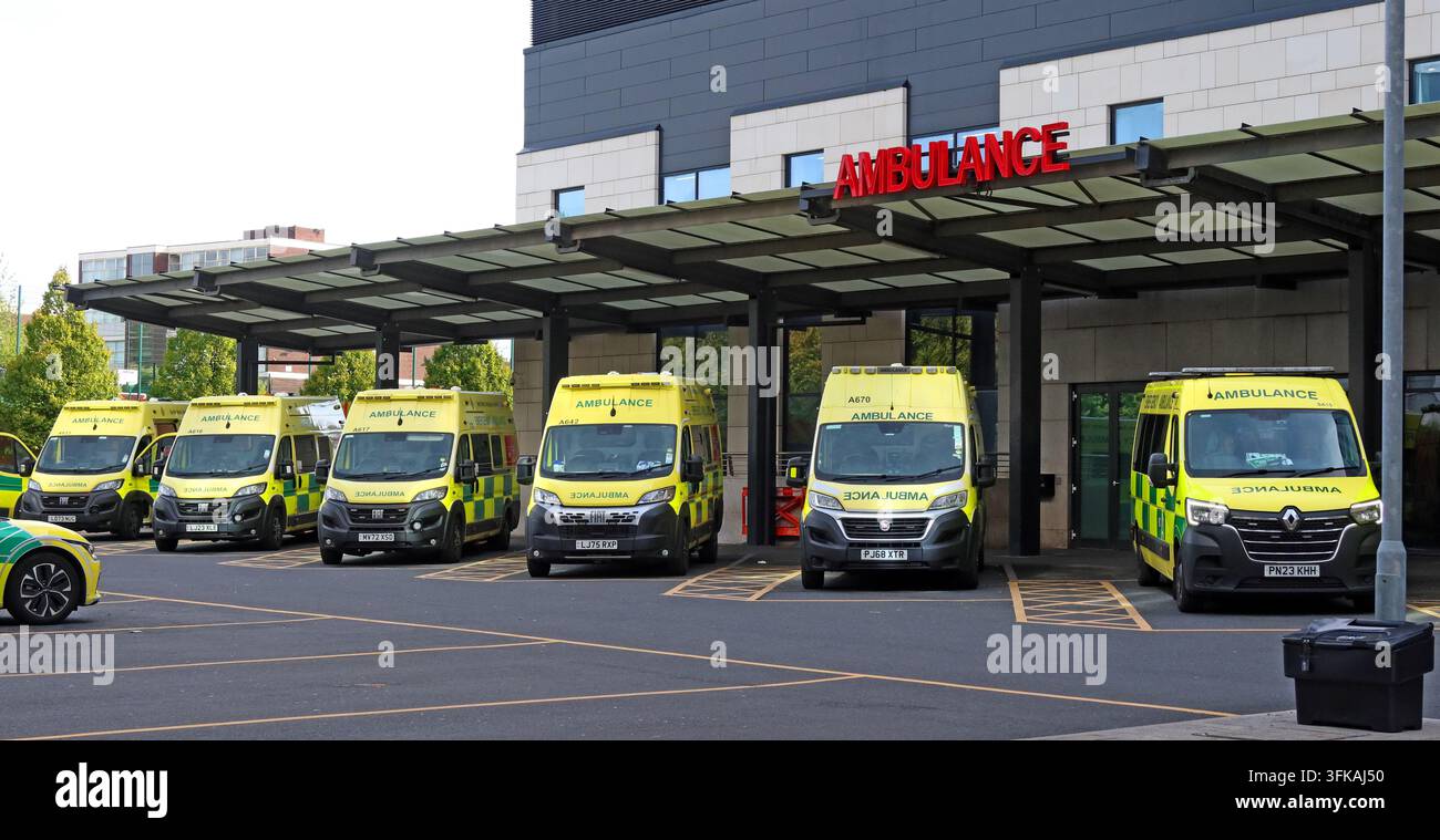 North West Ambulance Service vehicles lined up outside A&E at the Royal Liverpool University Hospital on Prescot Street, Liverpool. Stock Photo