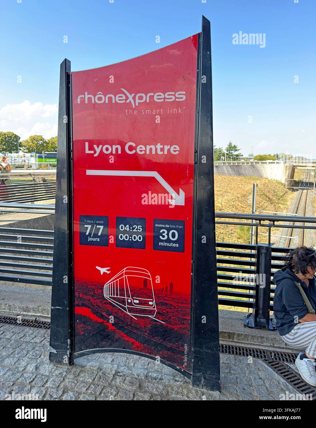 Rhônexpress sign at Lyon Saint-Exupéry Airport directing passengers to the express tram link for Lyon city centre. Stock Photo