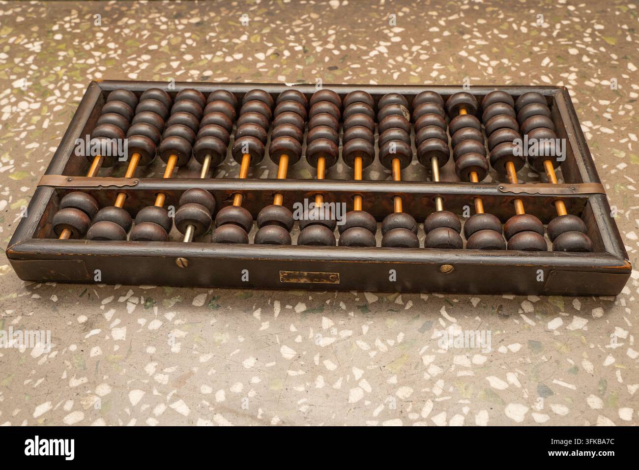 Close-up of a vintage wooden abacus on display Stock Photo