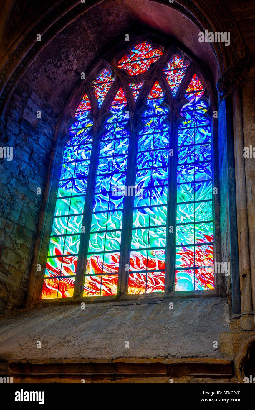 Blaze of light shining through cathedral window Stock Photo