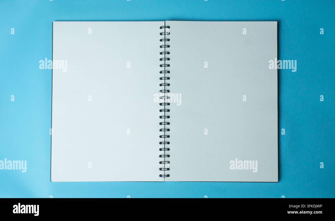 Open Blank Spiral Notebook Mockup for Creative Design Stock Photo