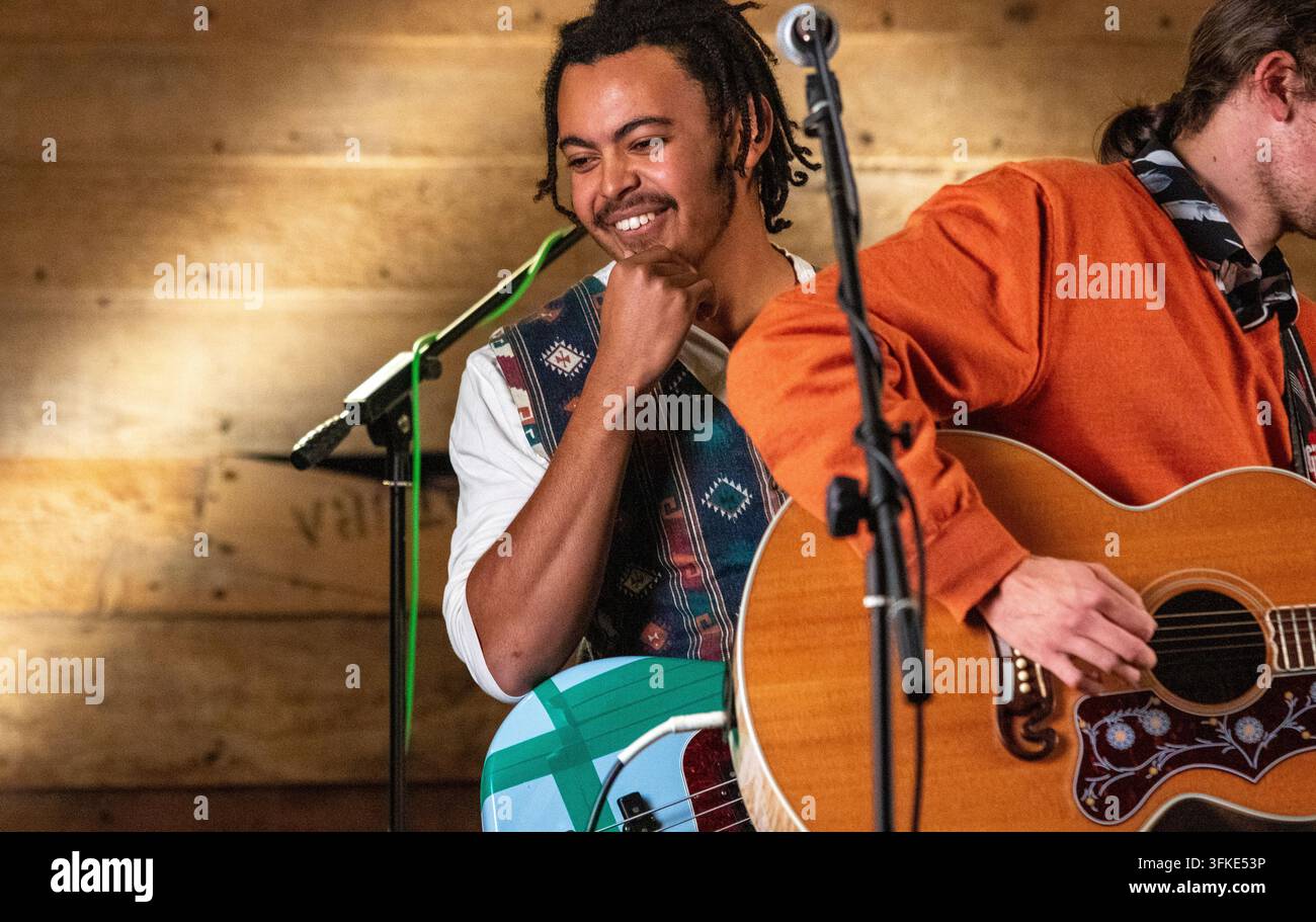 Open mike and jamming night at the Slate Barn arts venue in Sweffling a Suffolk village.  A real barn with electricity but no mains water or sewerage. Stock Photo
