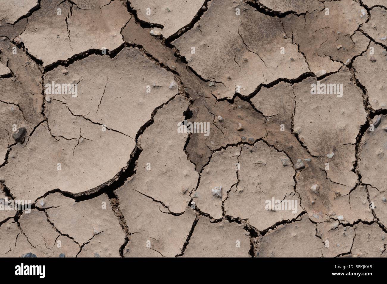 Cracks and textures in dried earth Stock Photo