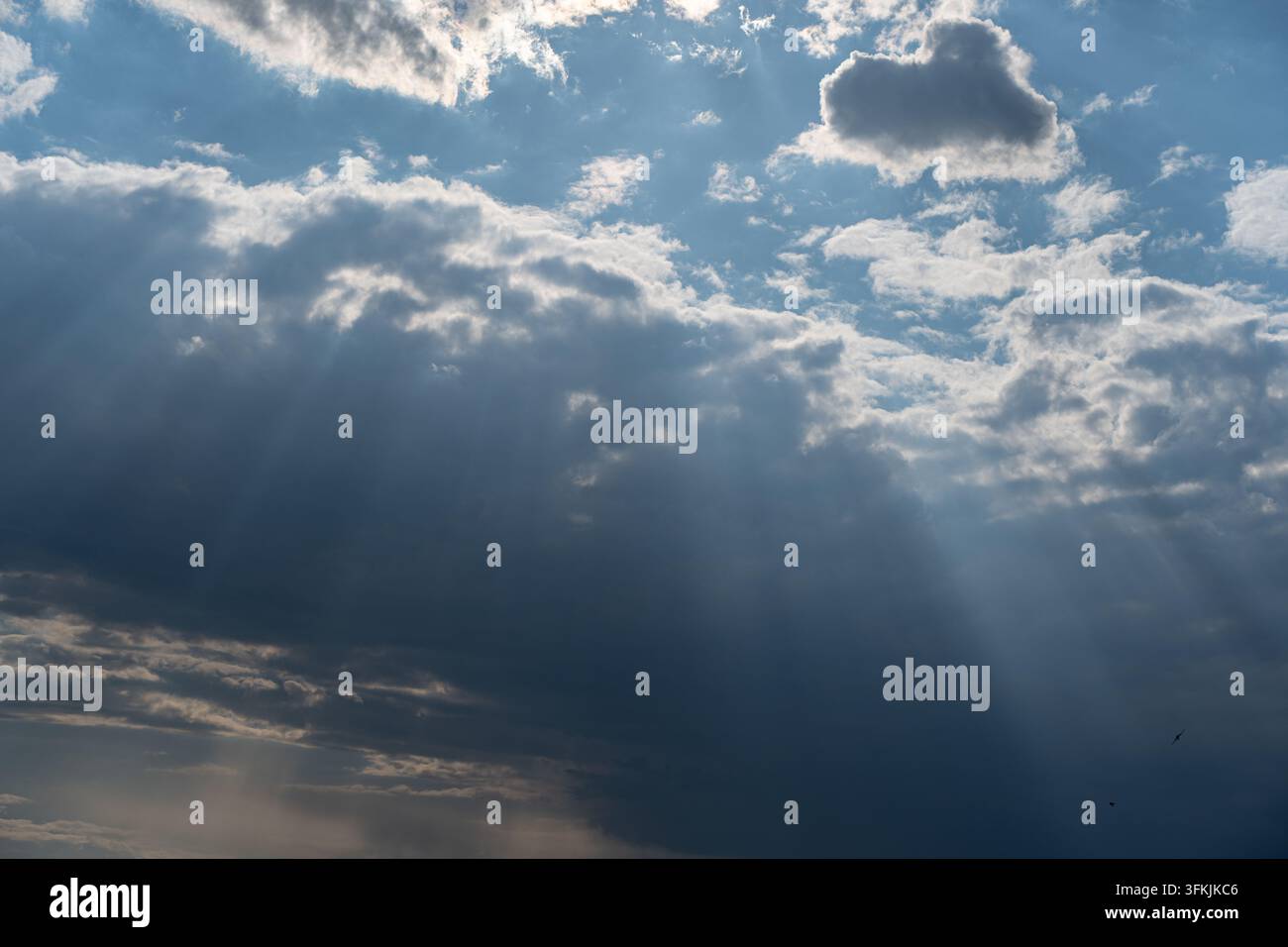 Jesus light shining through clouds in the sky Stock Photo