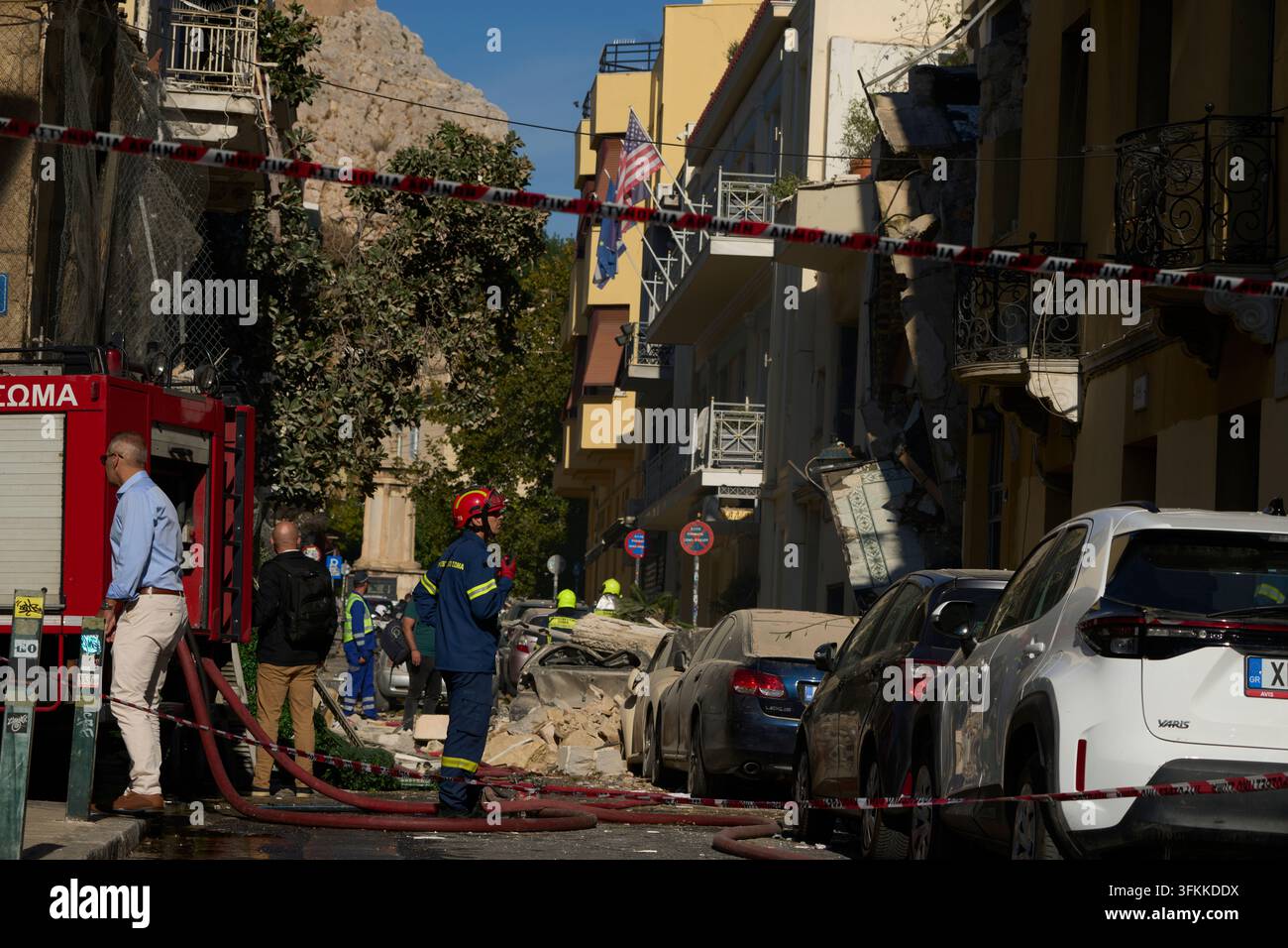 Firefighters work at the scene following a powerful blast that caused a ...