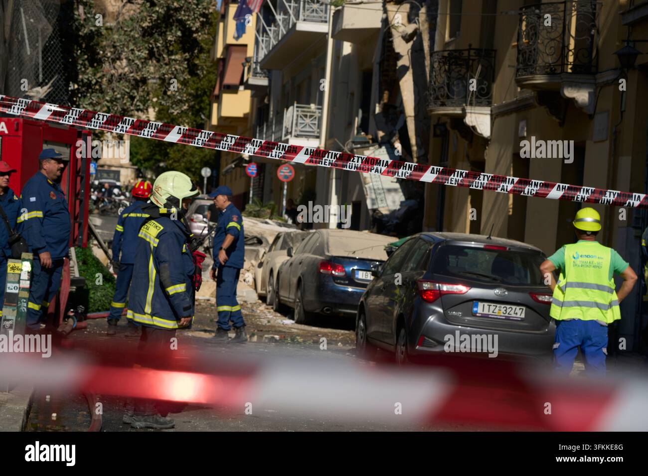 Firefighters work at the scene following a powerful blast that caused a ...