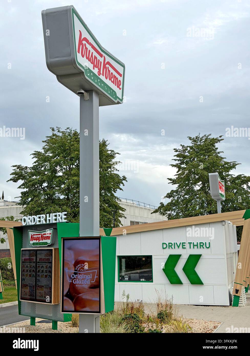 Krispy Kreme Drive Thru at Unit 3 School Brow in Warrington, Cheshire. Stock Photo