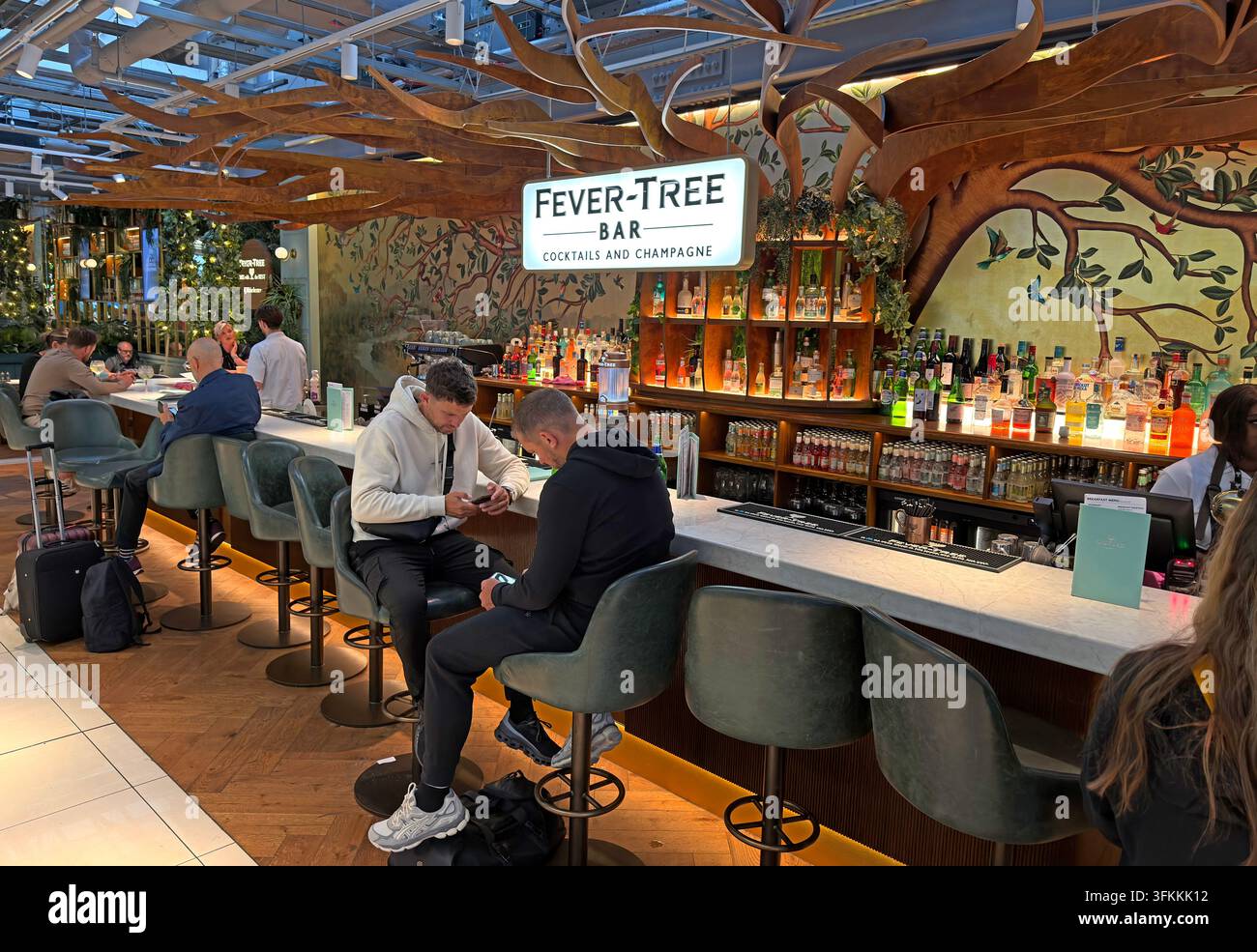 Fever-Tree gin, cocktail and champagne bar inside Manchester Airport Terminal 2. Stock Photo