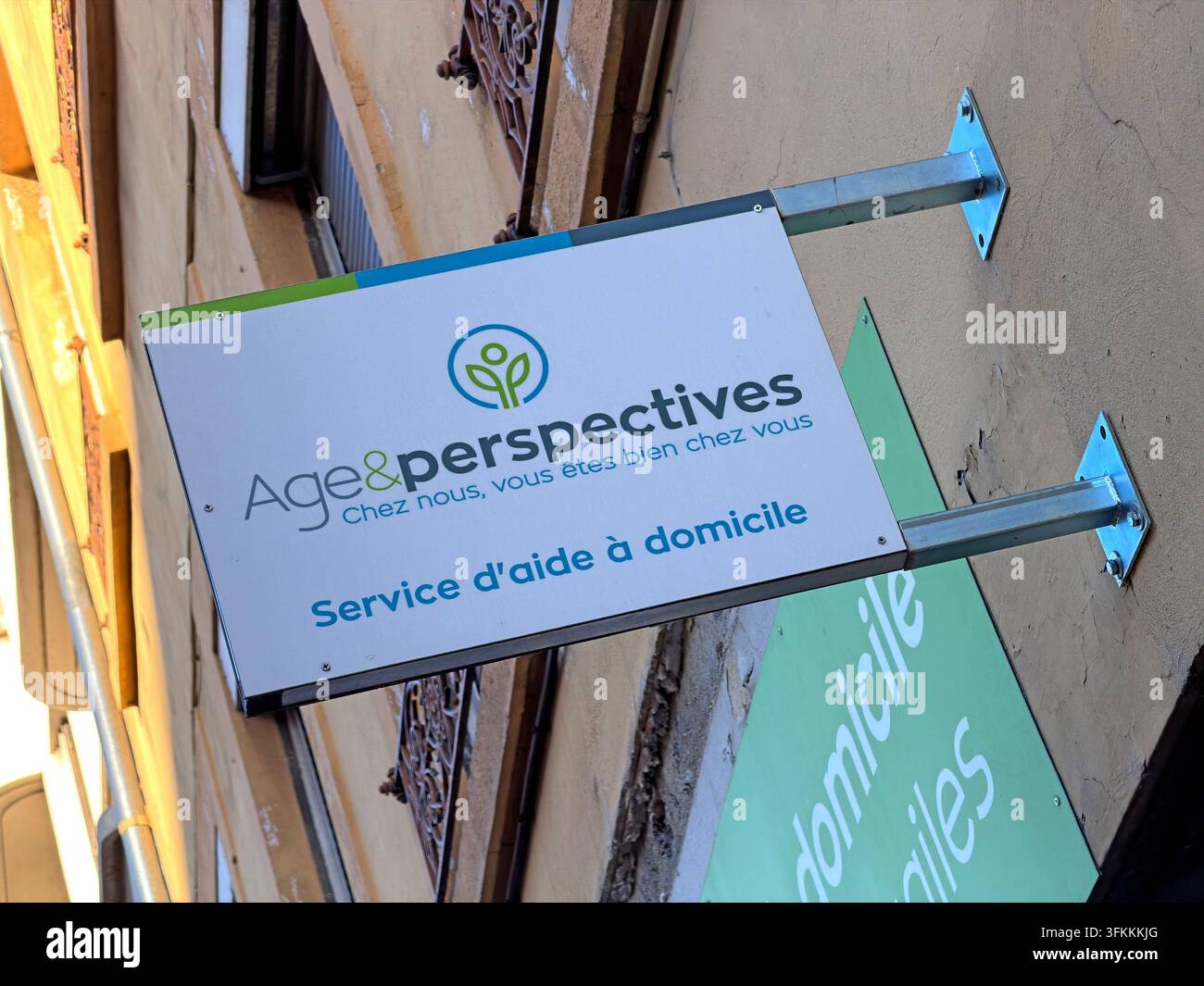 Age et Perspectives home-help service sign in Lyon advertising assistance for older and vulnerable people. Stock Photo