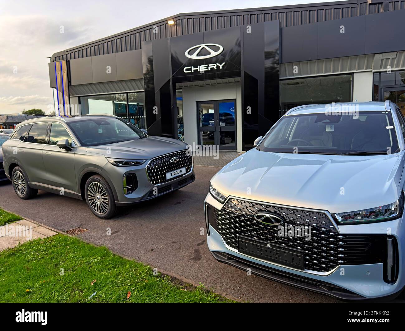Chery Tiggo 9 SUVs outside a UK dealership as the Chinese car brand expands into the British market.growing debate over Britain’s divergence from EU Stock Photo