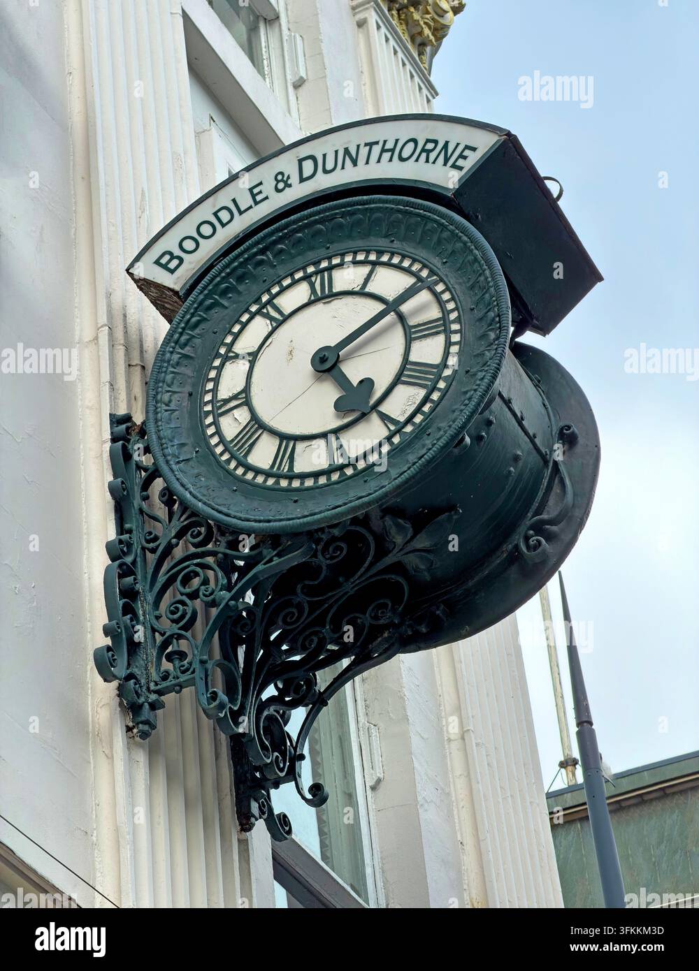 Historic Boodle & Dunthorne projecting street clock on Lord Street in Liverpool city centre, recalling Liverpool’s long watch and jewellery trade. Stock Photo
