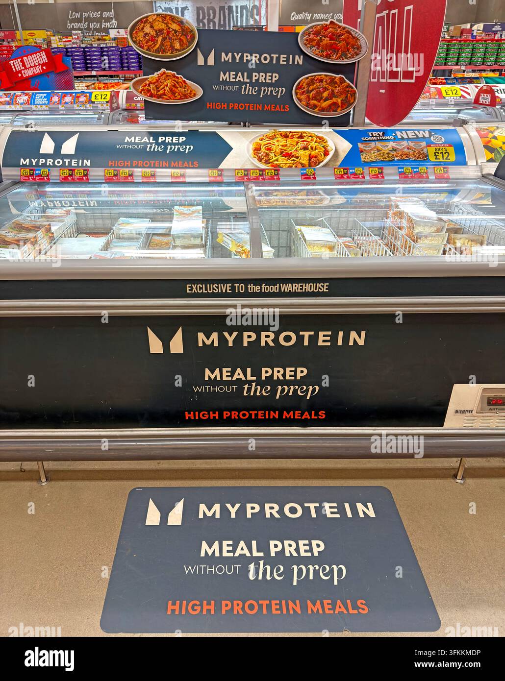 Myprotein high-protein ready meals promoted inside The Food Warehouse by Iceland supermarket. High protein meals for gym or GLP-1 users Stock Photo
