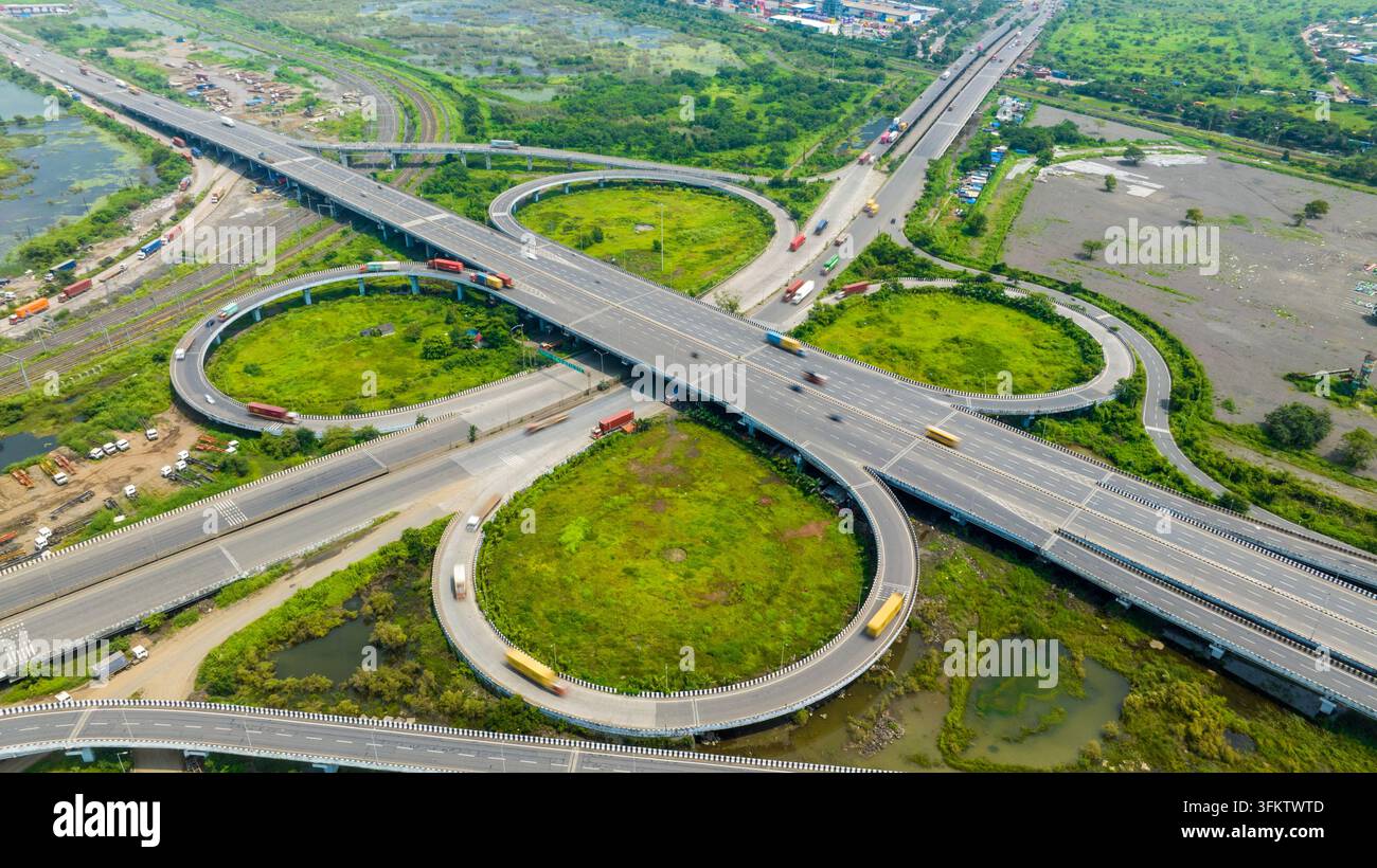Driving Ramp Vector Aerial view of the JNPT Interchange featuring complex highway ramps and ...