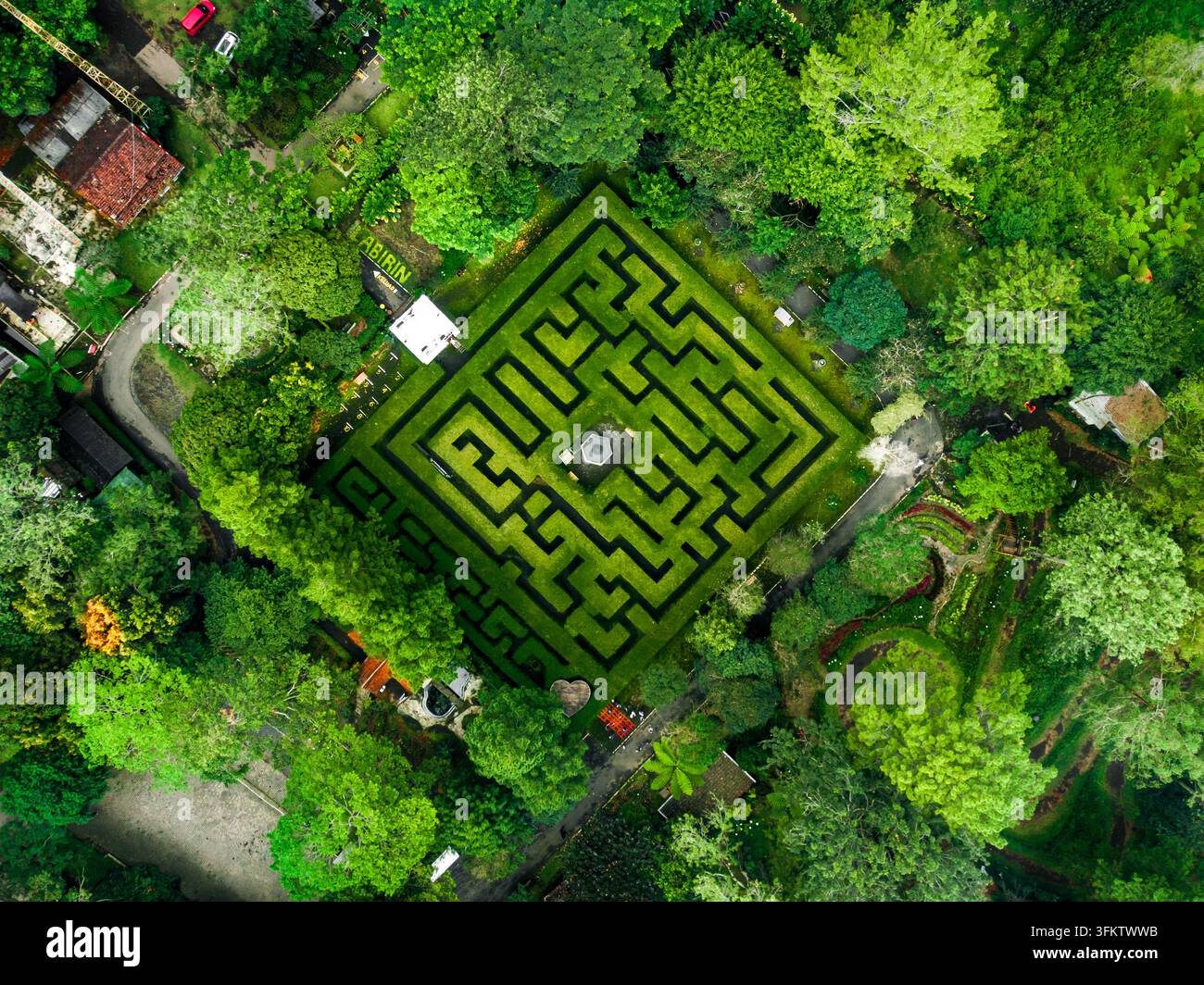 Aerial view of the hedge maze at Coban Rondo Waterfall Pujon surrounded ...