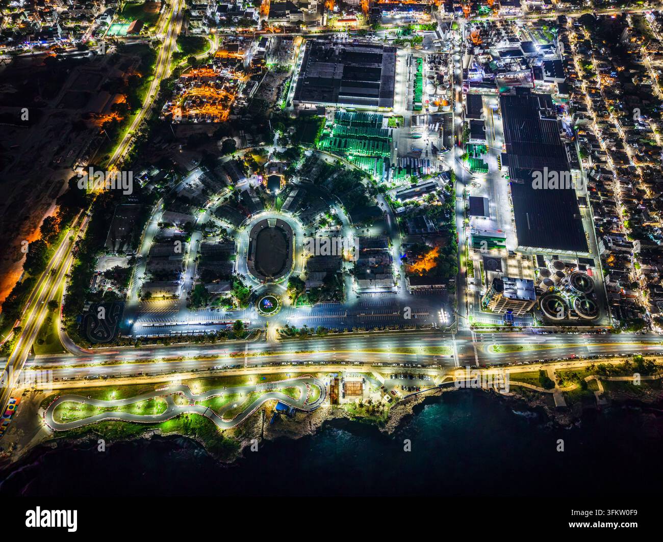 Aerial view of Feria Ganadera illuminated at night with surrounding ...