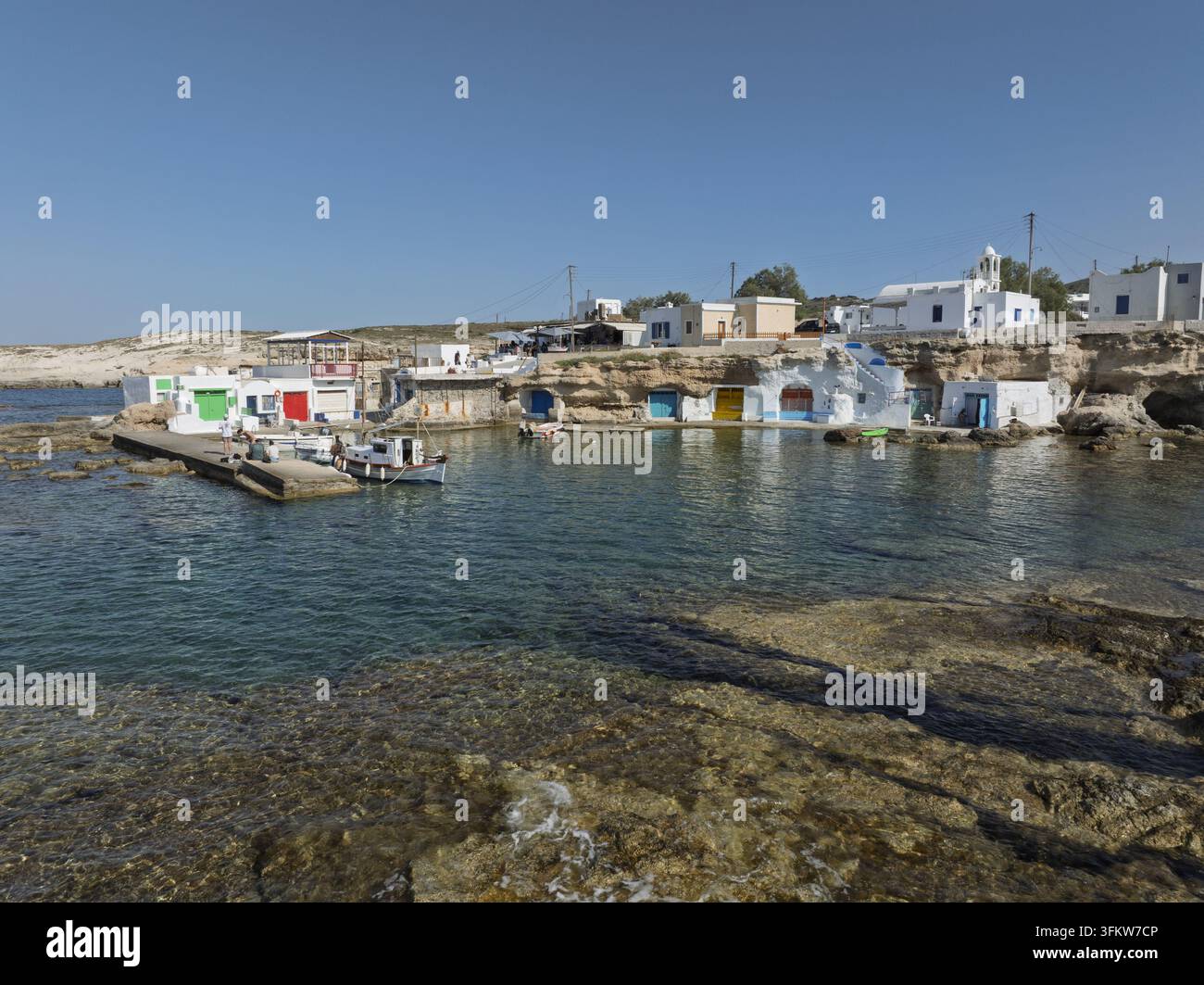 Aerial View Rocks Aerial view of the traditional colorful boat houses known as syrmata ...