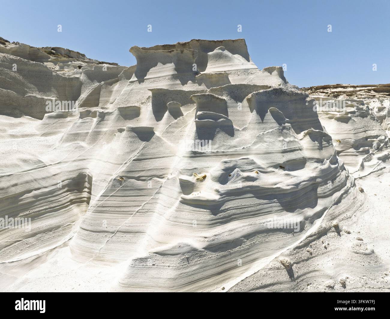Aerial view of the white volcanic rock formations of Sarakiniko Beach ...
