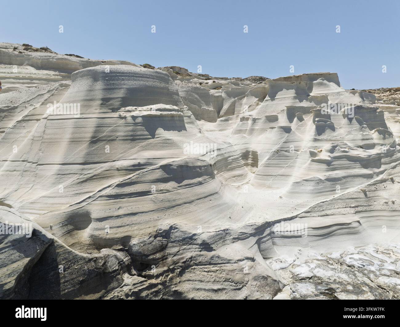 Aerial view of the white volcanic rock formations of Sarakiniko beach ...