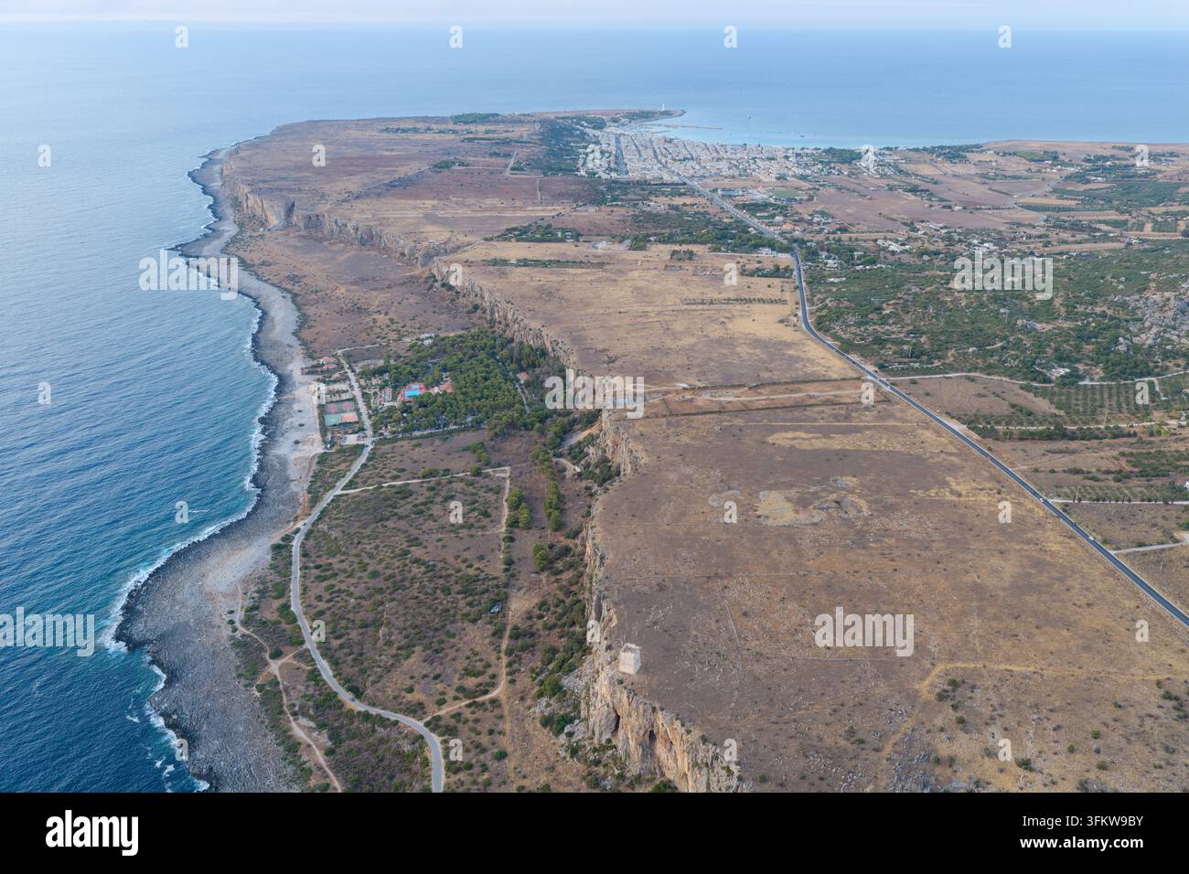 Aerial view of the rugged coastline and cliffs of Riserva Naturale ...