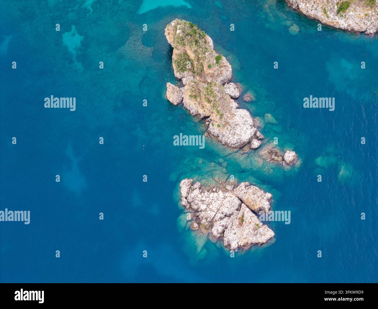 Aerial view of the rocky islets of Riserva Naturale Orientata dello ...