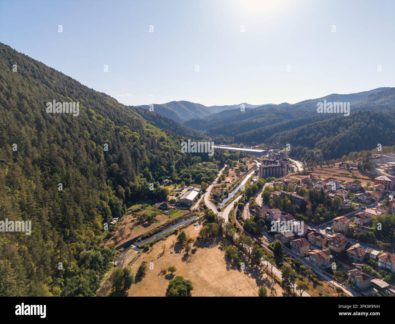 Aerial view of the town of Velingrad nestled in a lush valley ...