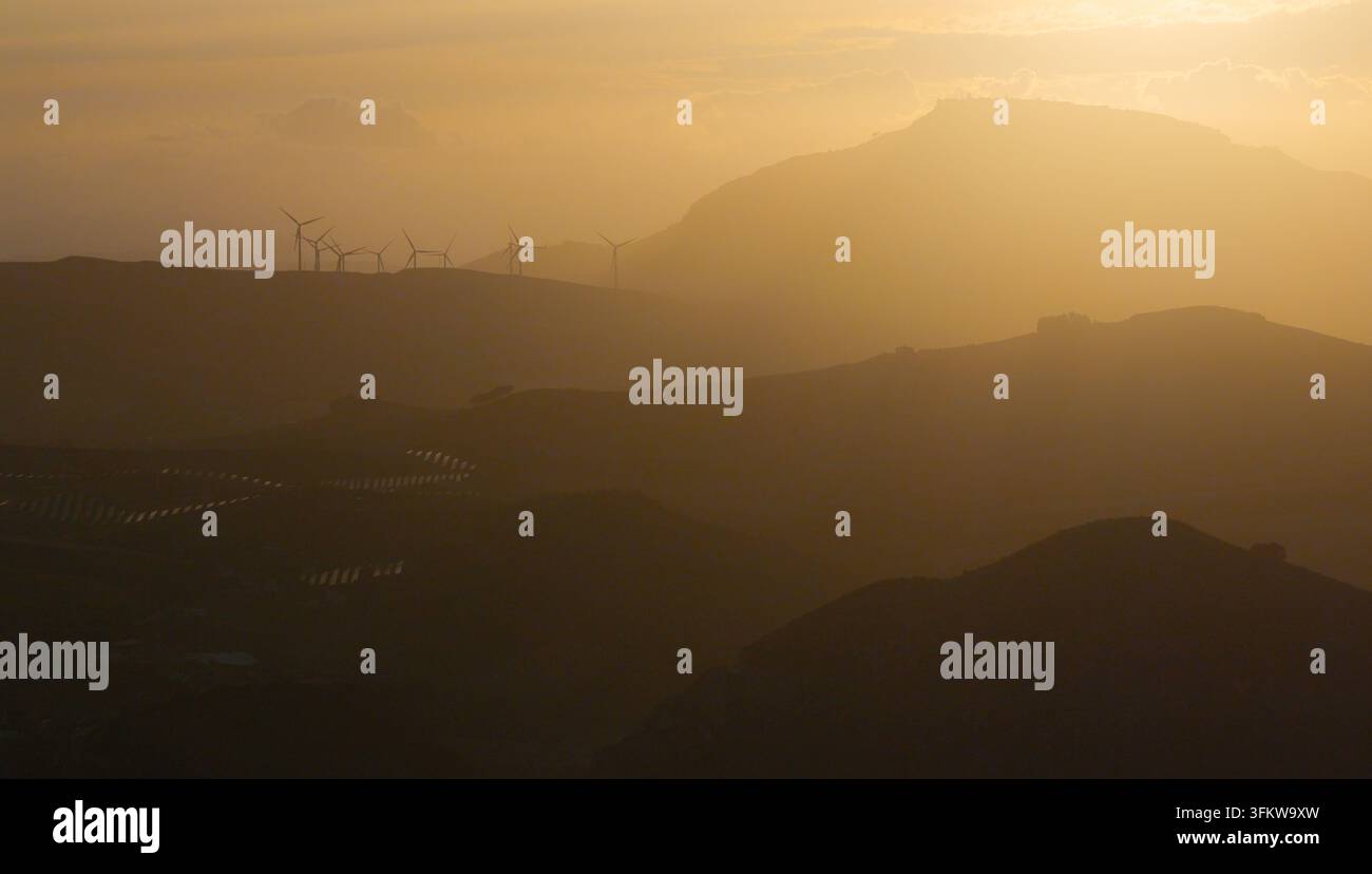 Aerial view of wind turbines on the rolling hills of Riserva Naturale ...