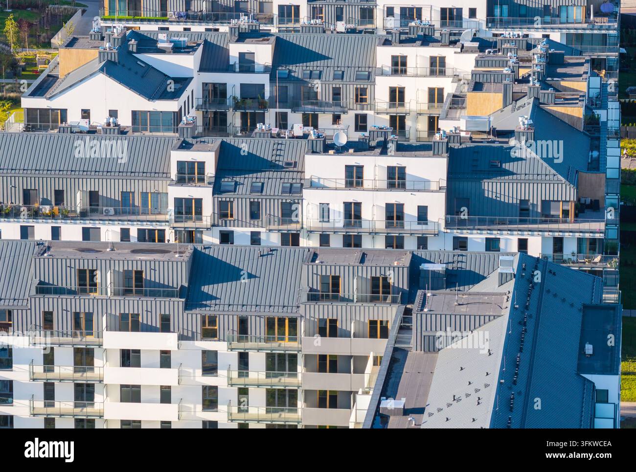 Aerial view of modern residential apartment buildings with grey metal ...
