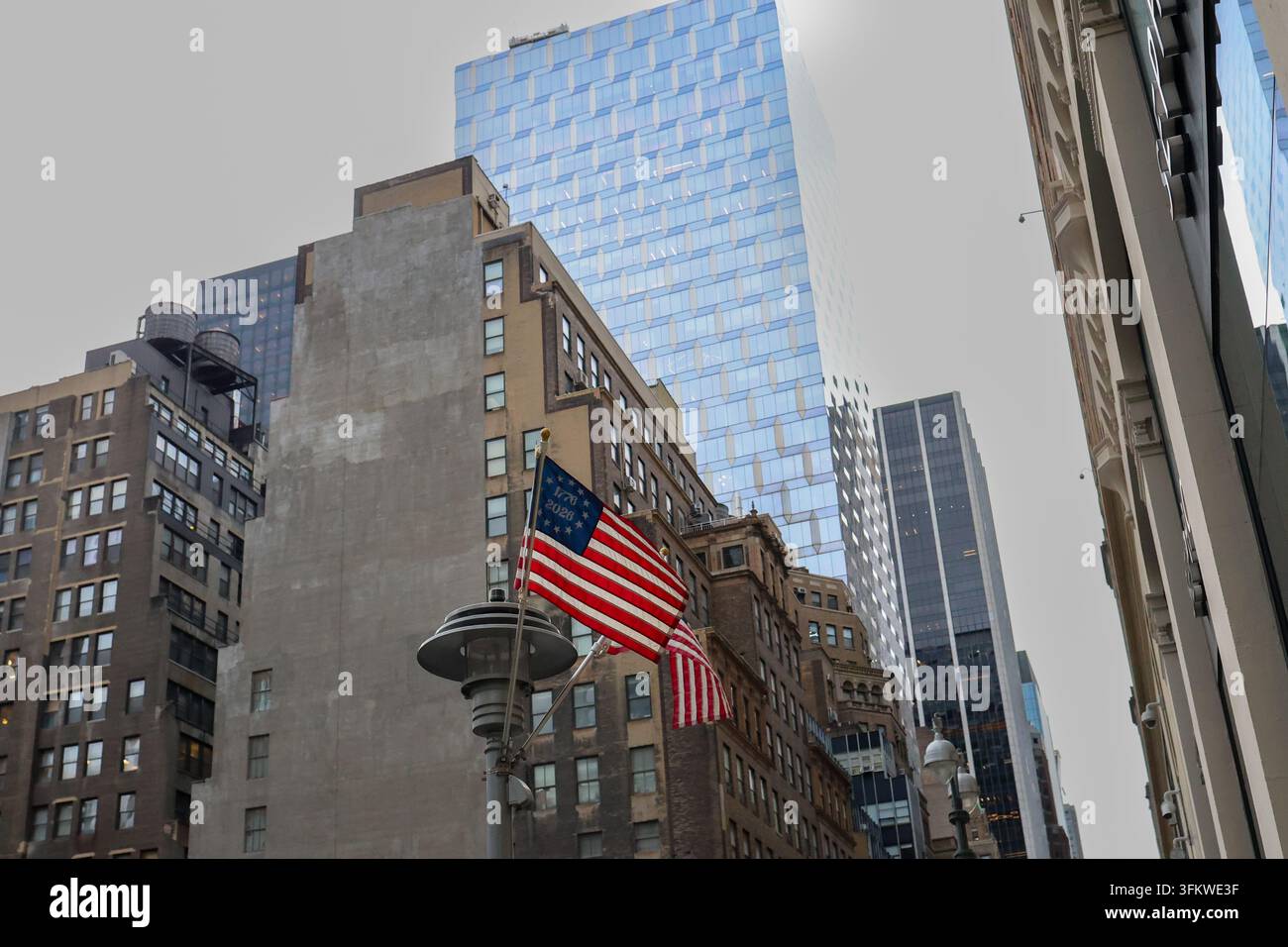 Patriotic America 250 flags fly in the foreground, framing the soaring ...