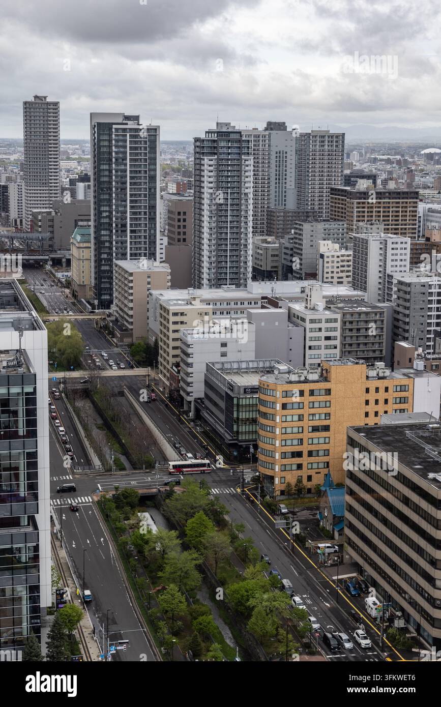 Aerial view of the modern skyline with high-rise buildings, busy ...