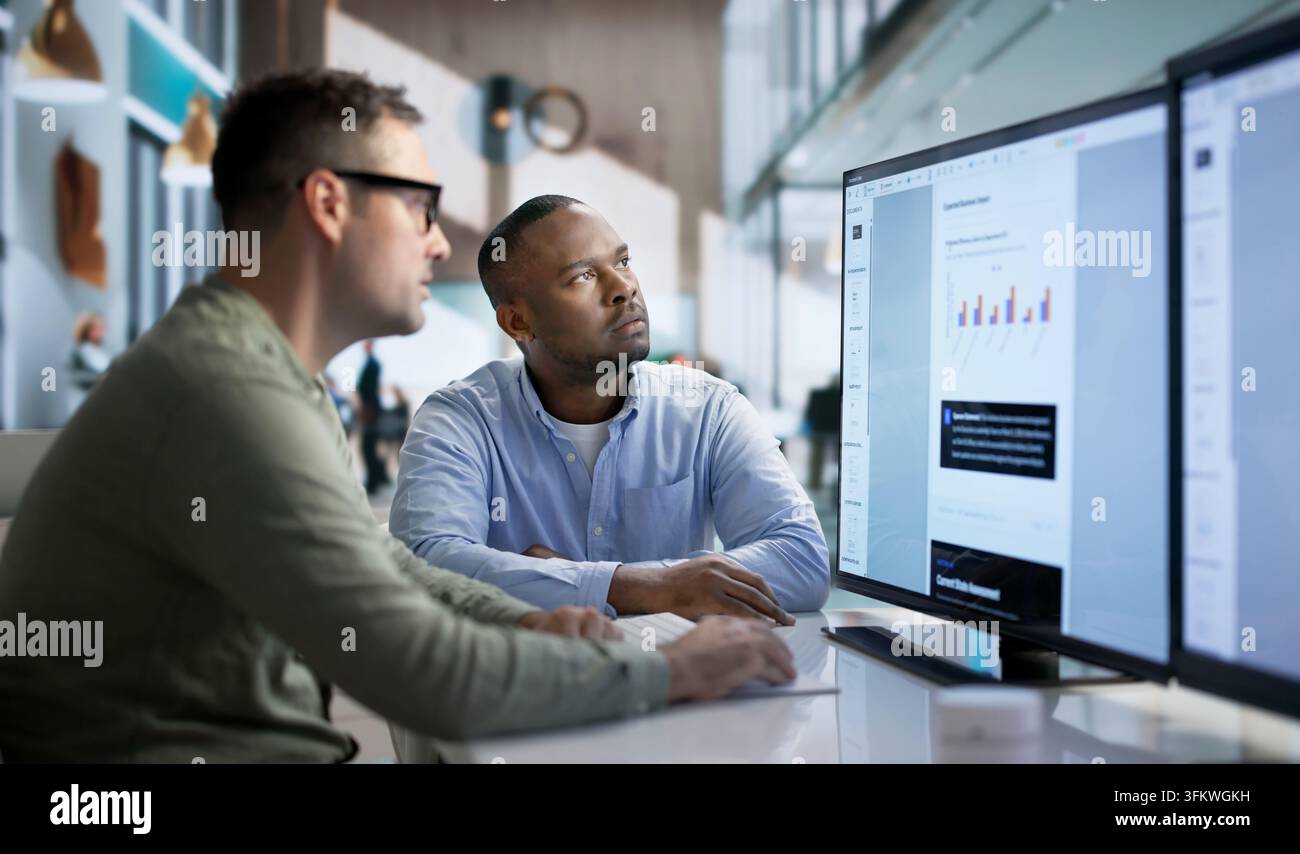 Software Developer Analyzes Artificial Intelligence Plan While Collaborating With Team. Stock Photo