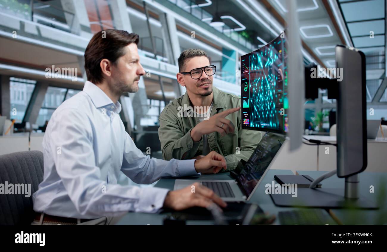 Data Scientist Uses Laptop And AI Tools To Build Predictive Models Collaboratively. Stock Photo