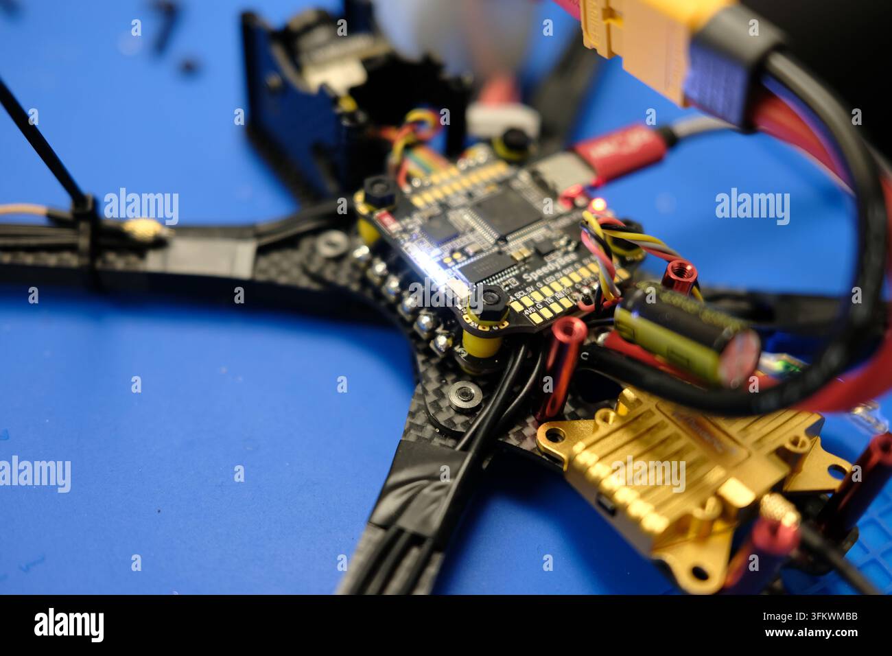 Drone Flight Controller Circuit Board Macro. Surface-mount components and traces fill the frame. Stock Photo