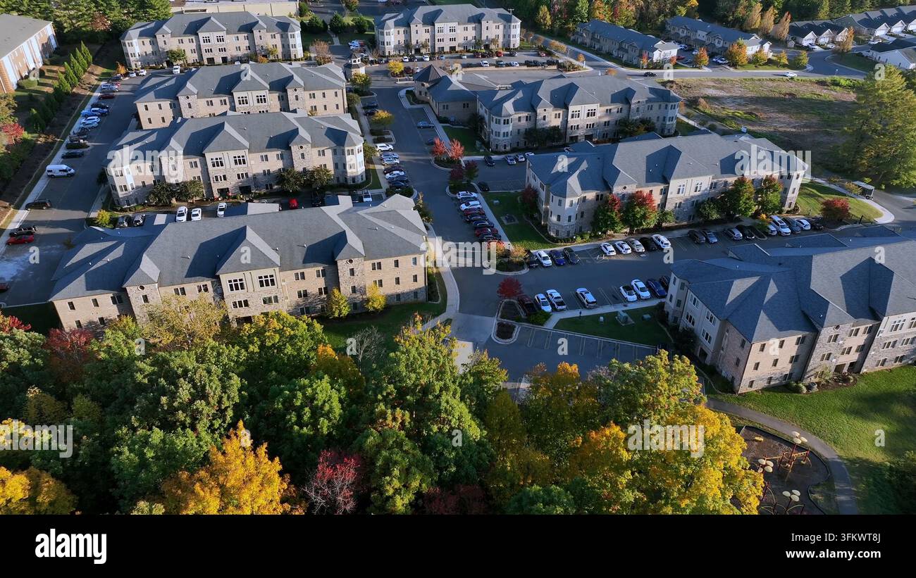 Aerial view of a modern apartment complex with multiple buildings ...