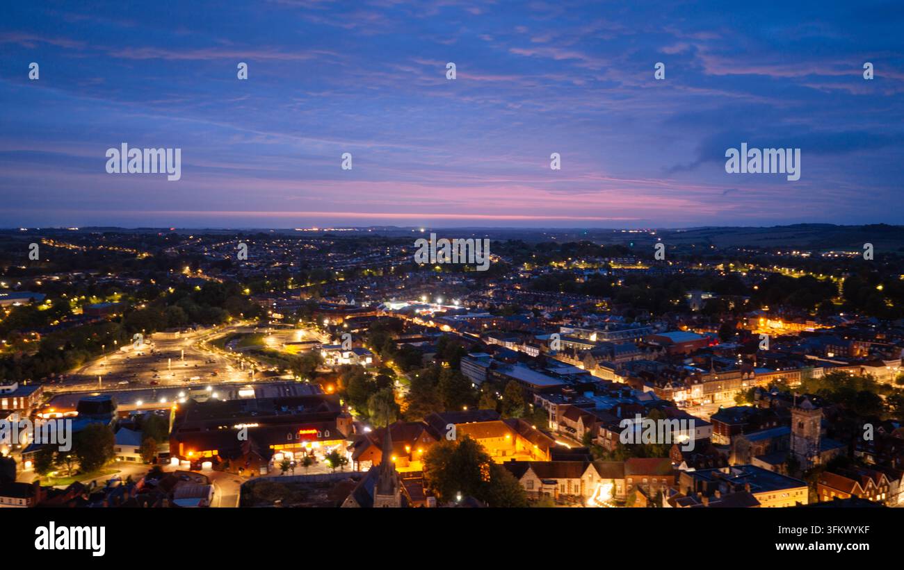 Aerial view of the city of Salisbury at twilight with glowing street ...