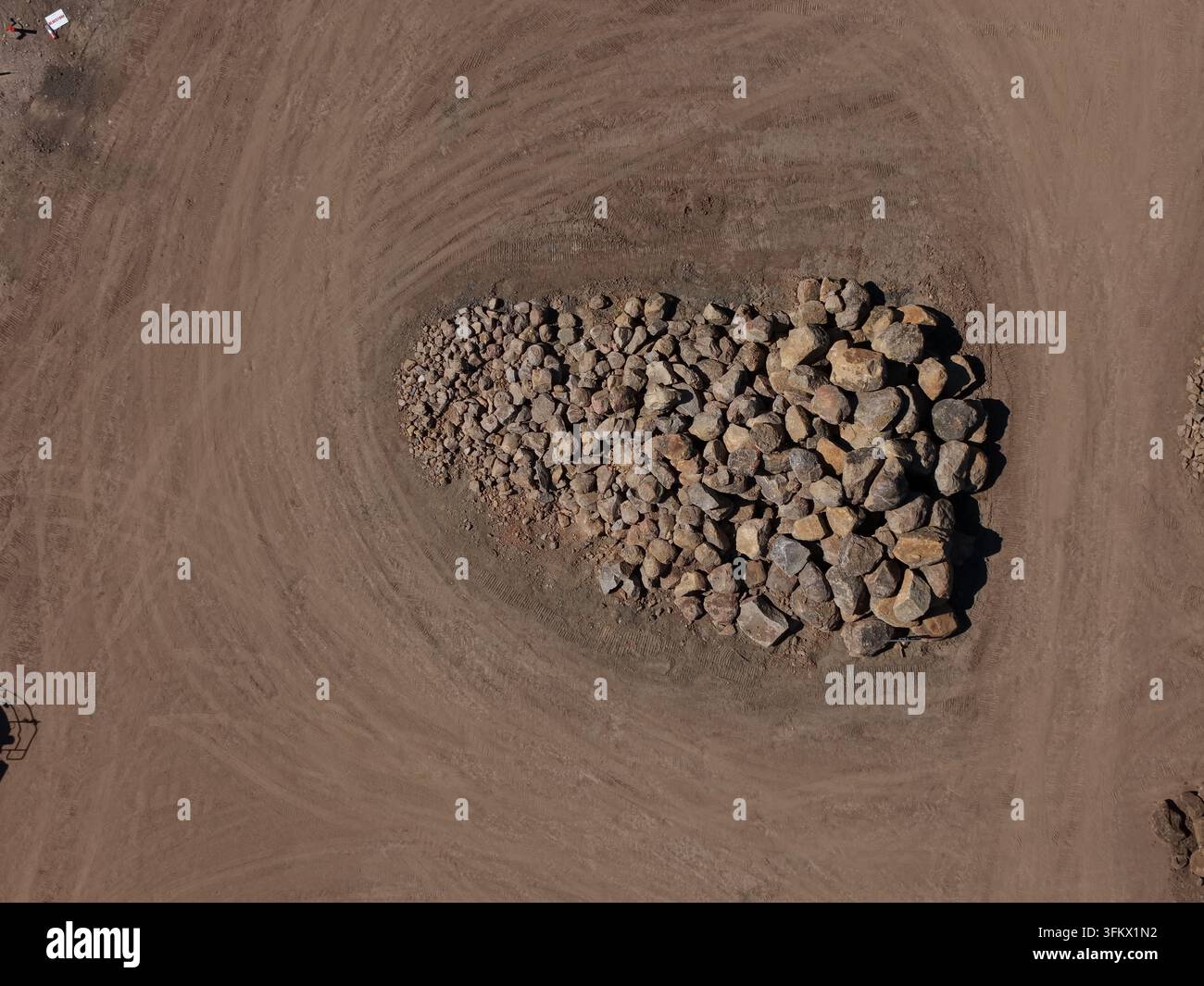 Aerial View Rocks Aerial view of a large pile of boulders and rocks situated in a dirt ...